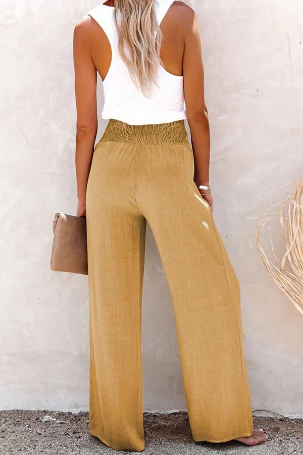 Modern women's high-waisted trousers, offering ultimate comfort and a sleek tailored look for fashion.