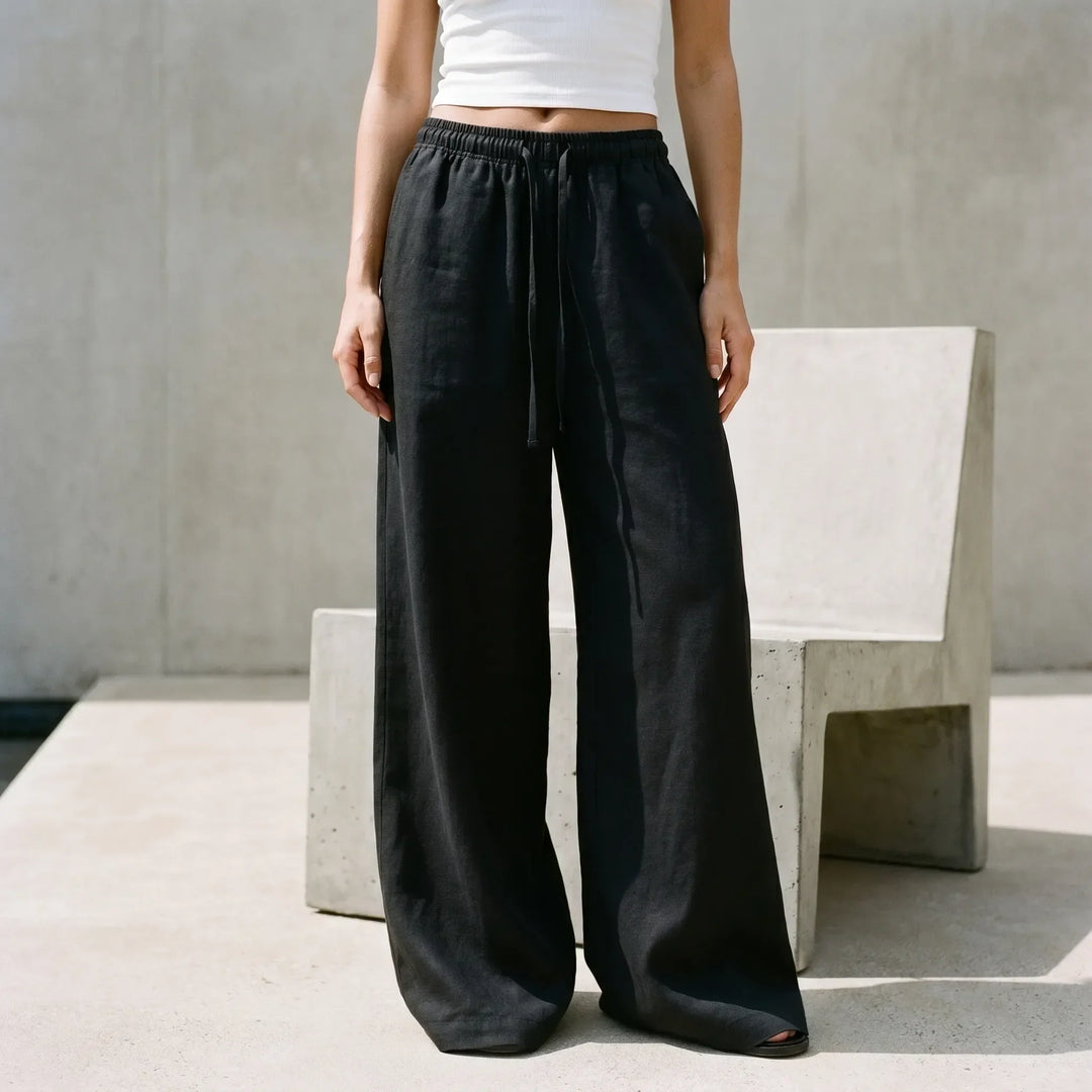 Women's high-waisted wide-leg casual pants with a comfortable drawstring waist, perfect for everyday summer fashion.