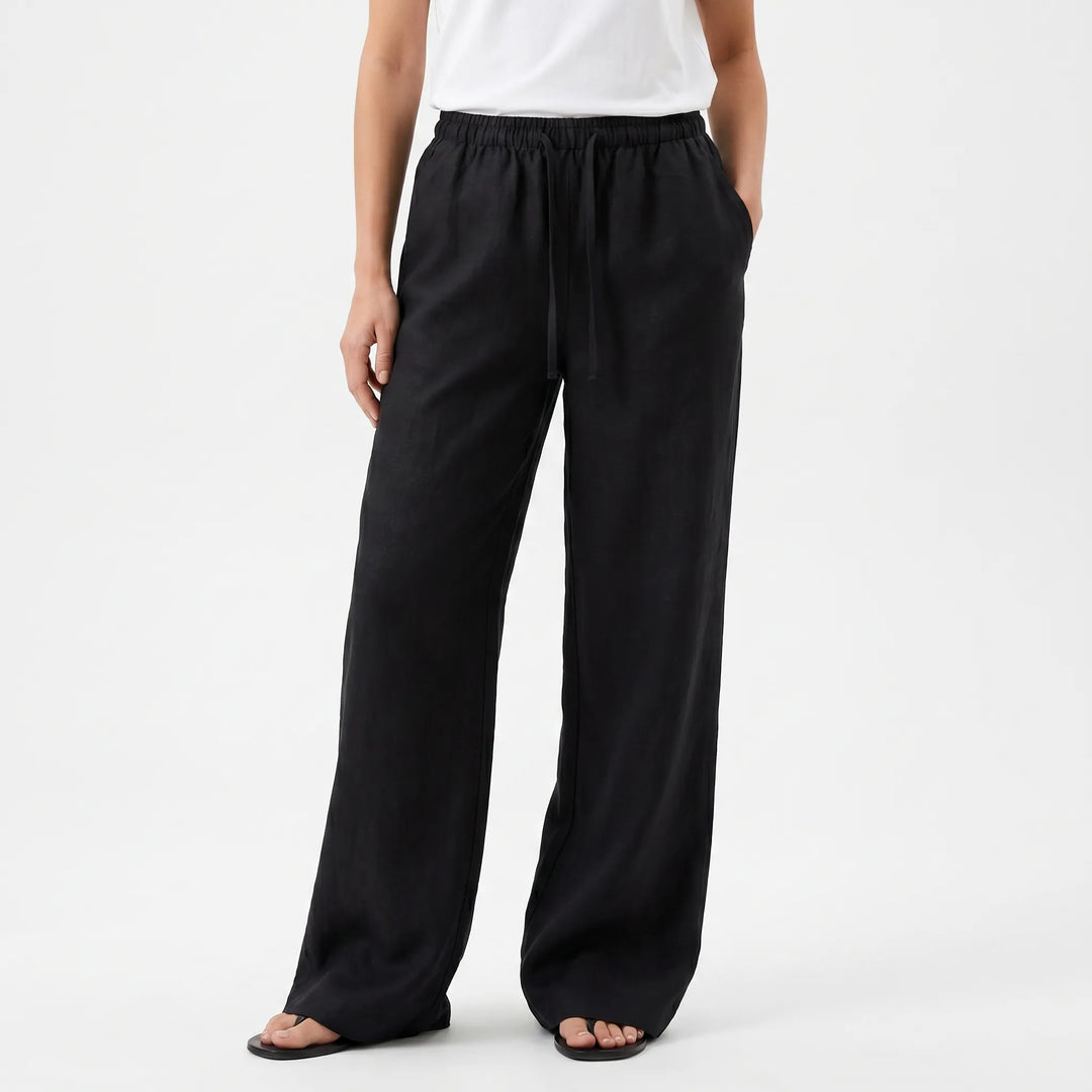 Effortless black wide-leg trousers for women, offering a loose fit and all-day comfort for casual wear.