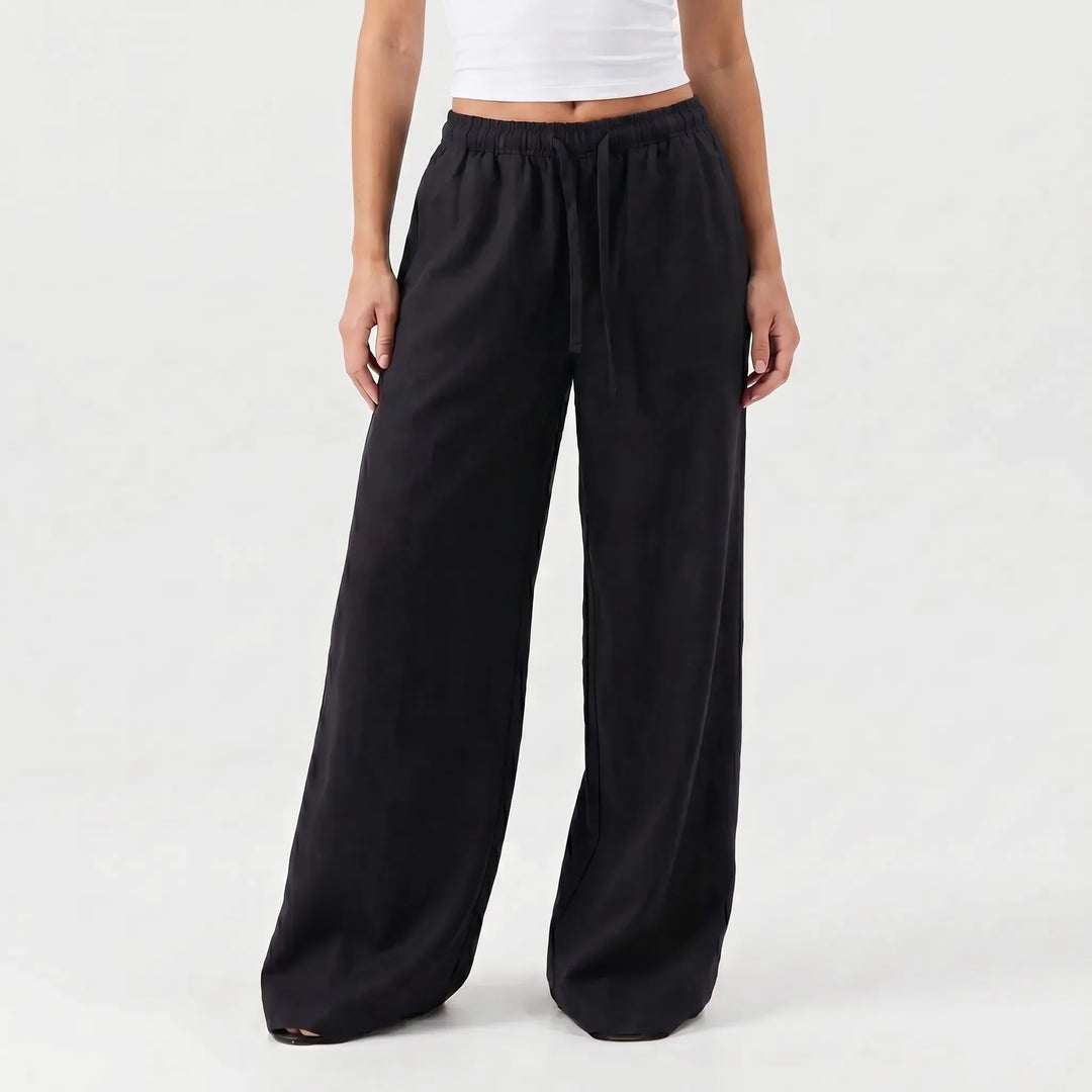 Comfortable women's wide-leg casual pants in a loose fit, featuring a drawstring waist for effortless style.