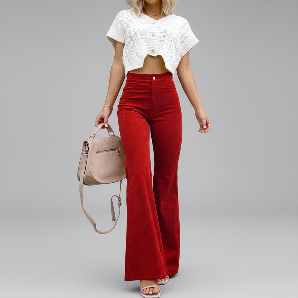 Detail of the high waist and button closure on women's sustainable corduroy flared trousers