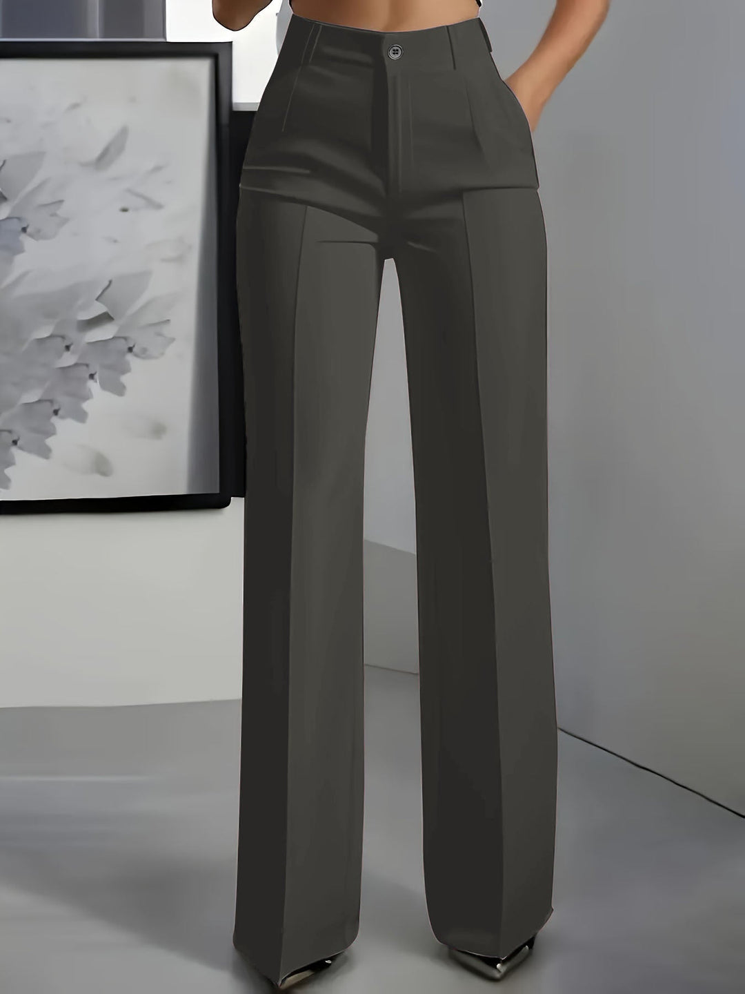 Elegant women's high-waist wide-leg office trousers. Structured fit provides a polished look while remaining comfortable for work.