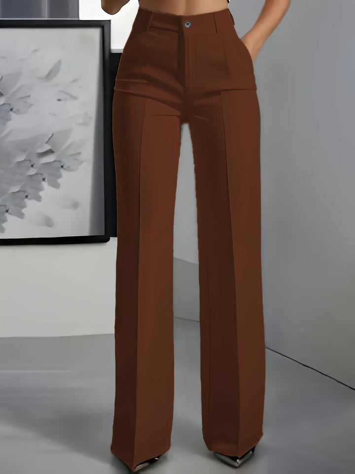 Comfortable women's high-waisted wide-leg trousers. Structured yet relaxed fit for versatile office and casual fashion.