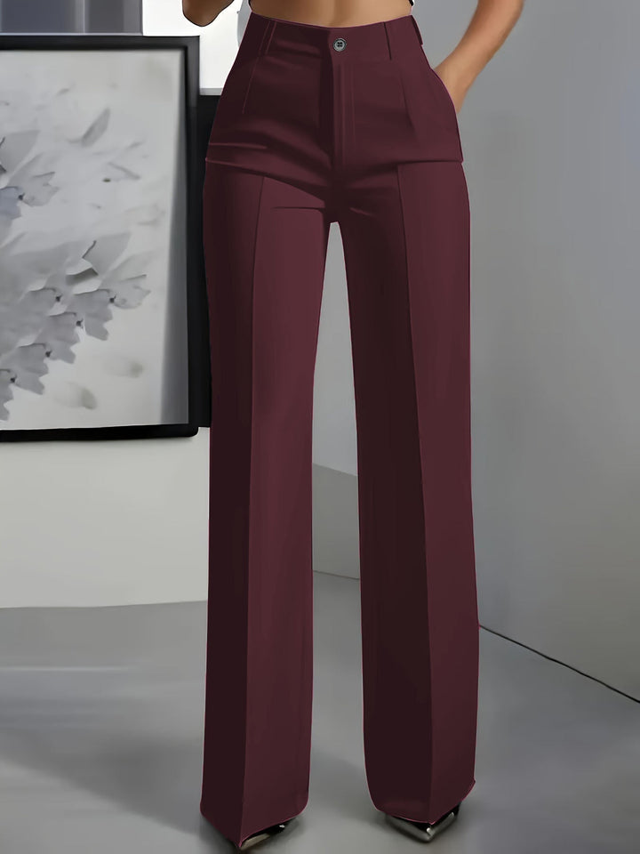 Women's structured wide-leg trousers with a flattering high waist. Designed for a polished look in office or casual settings.