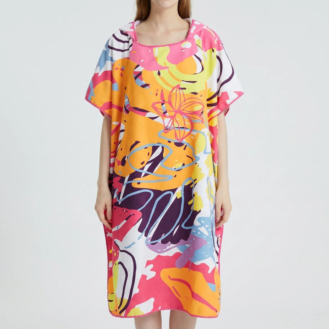 Vibrant print women's hooded towel poncho, perfect as a swim coverup or changing robe for beach and pool fun.