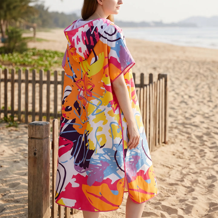 Quick-dry women's beach poncho towel. Absorbent hooded swim coverup and changing robe, ideal for travel and pool.