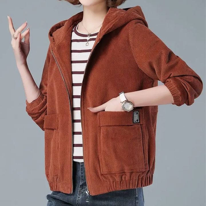 Relaxed fit women's hooded jacket. Comfortable casual outerwear with a zip front, ideal for layering.