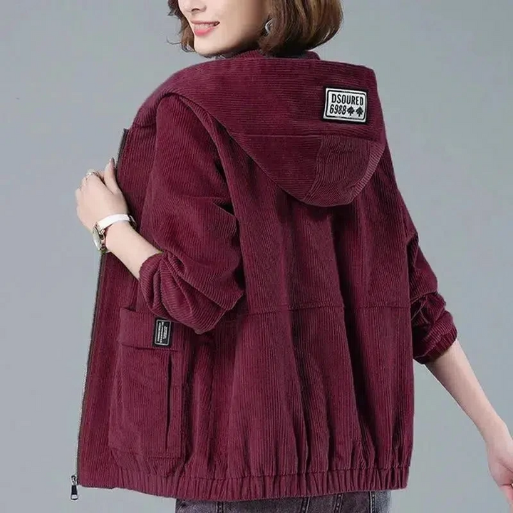 Everyday women's hooded jacket, casual style, relaxed fit. Features a practical zip front.