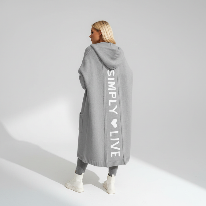 Warm women's long knit cardigan with hood, essential winter fashion