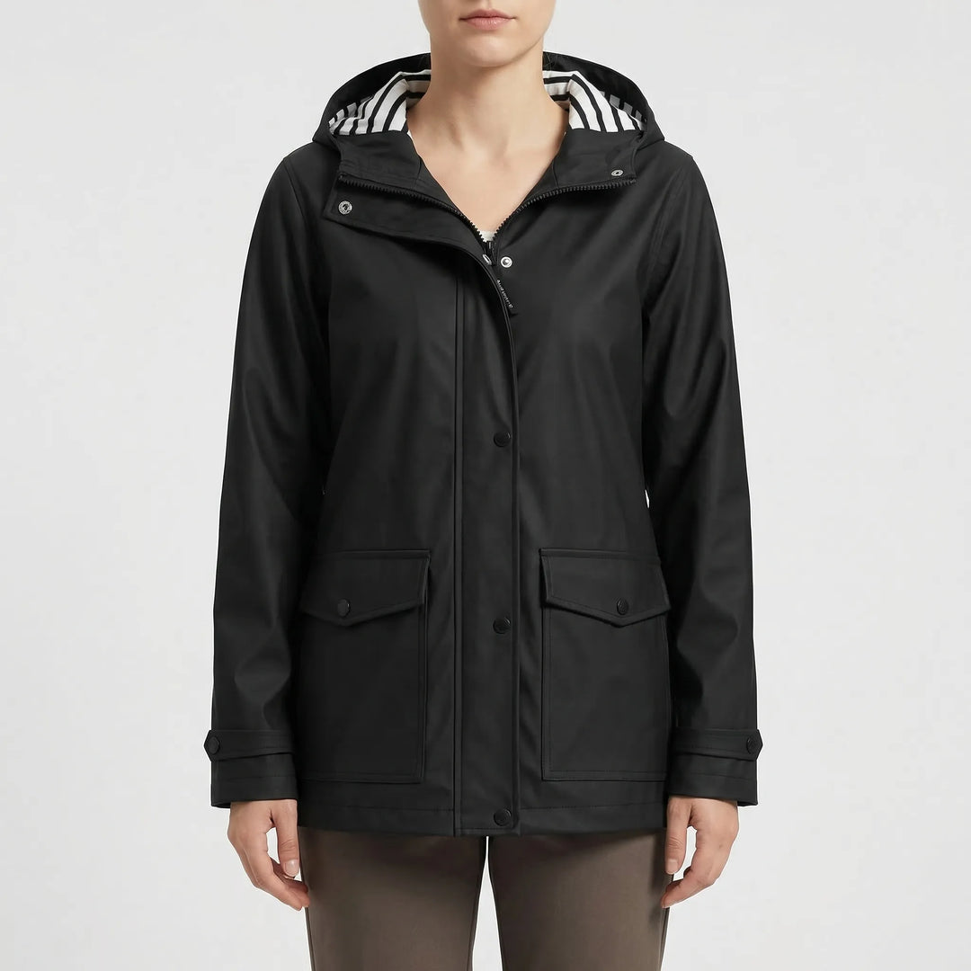 Durable women's waterproof hiking jacket with hood. Ideal outdoor gear for trails & camping.