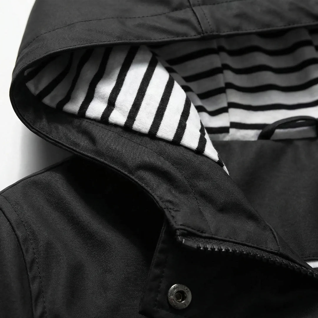 Stylish women's lightweight hooded waterproof jacket, perfect for casual wear & travel.