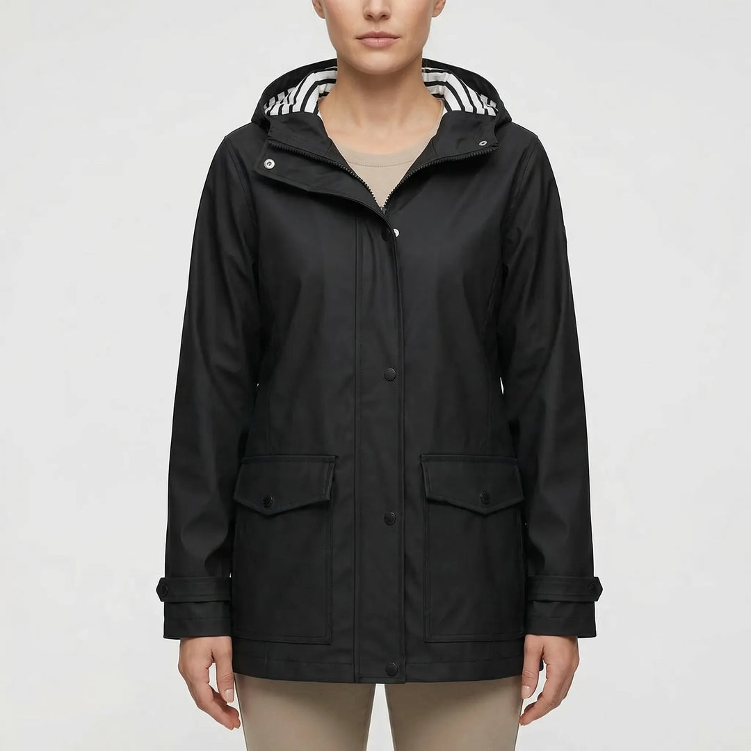 Packable women's travel jacket, waterproof & hooded. Essential lightweight outdoor gear for explorers.