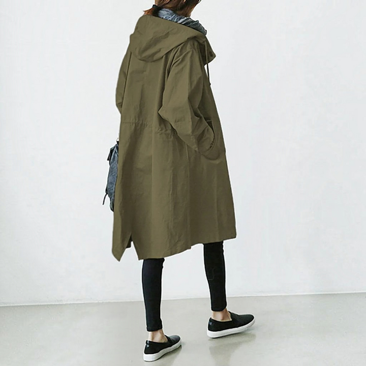 Elegant women's fashion trench coat, hooded & waterproof long outerwear. Ideal all-season raincoat.