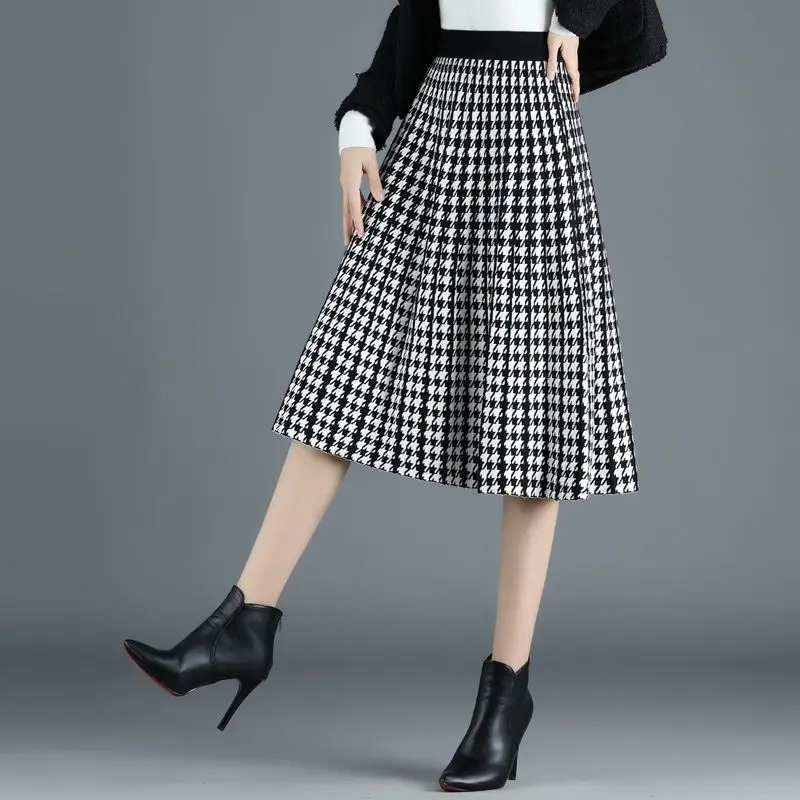 Women's houndstooth pleated midi skirt, elegant A-line style with high-waist, perfect for office wear & fall fashion.
