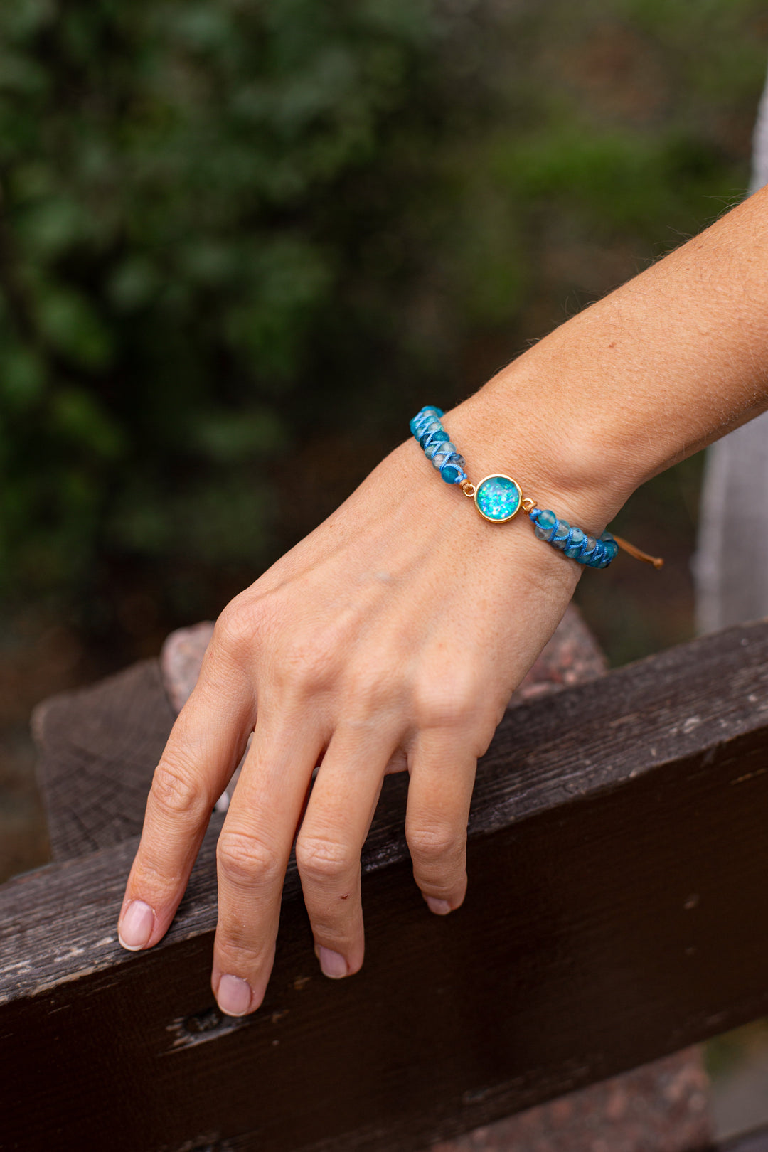 Close-up of Hypnotic Blue Opal Bracelet with iridescent opal, blue quartz & silver chain