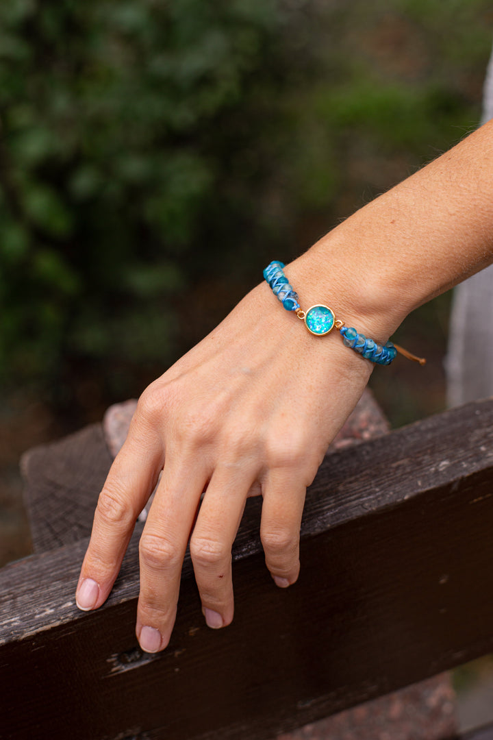 Close-up of Hypnotic Blue Opal Bracelet with iridescent opal, blue quartz & silver chain