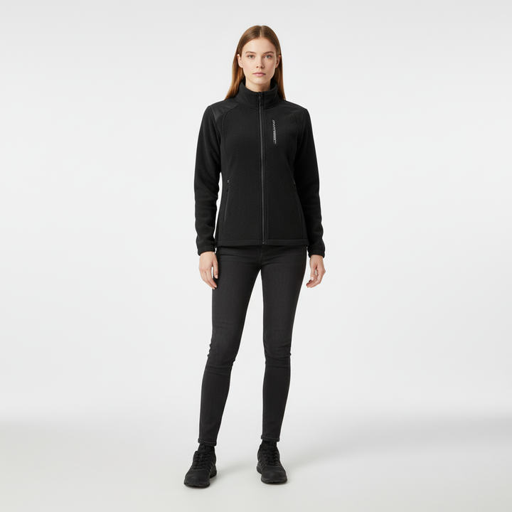 Close-up of women's Ingrid fleece jacket texture, showing warmth and zip pocket detail