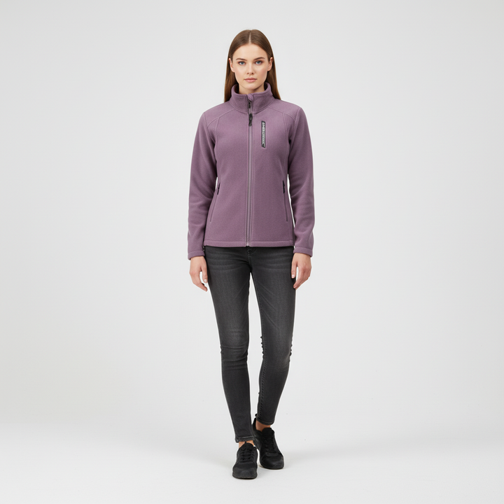 Side view of women's Ingrid fleece outdoor jacket, showcasing flattering cut and zip pockets