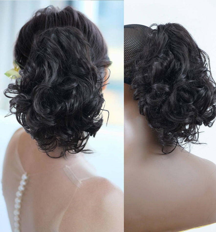 Synthetic curly ponytail extension with clip-in design, provides instant volume & effortless style.