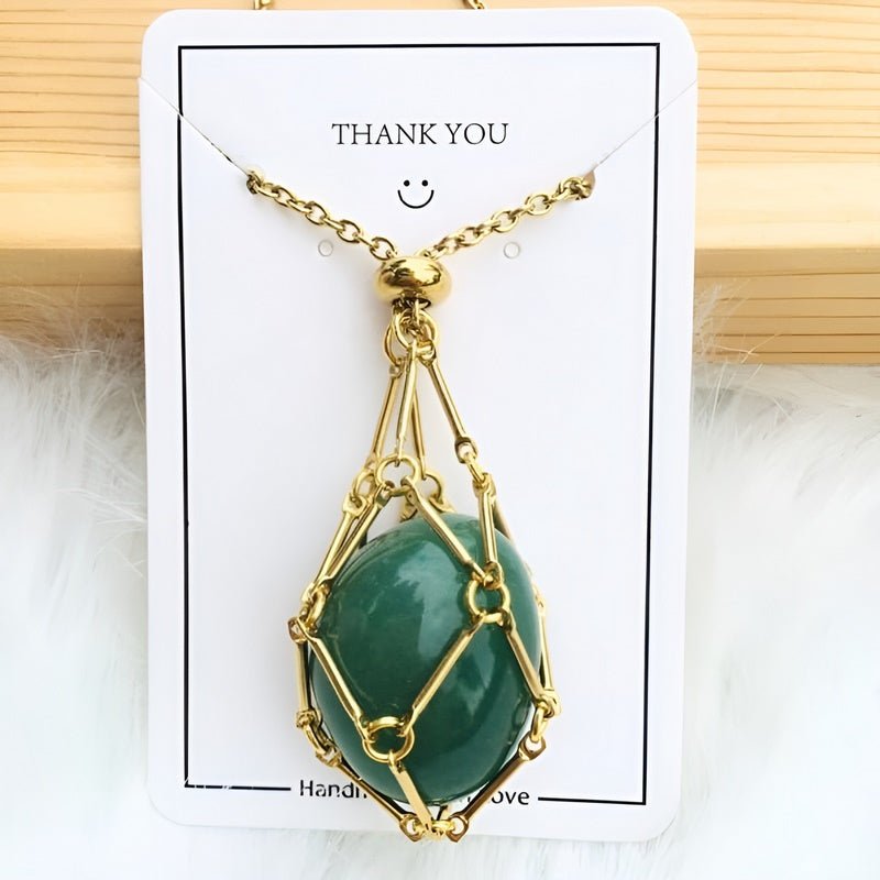 Detailed crystal holder necklace for women. Securely holds interchangeable gemstone pendants & healing crystals.