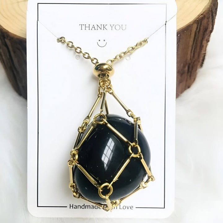 Everyday women's crystal holder necklace. Interchangeable gemstone pendant for personalized healing crystal wear.