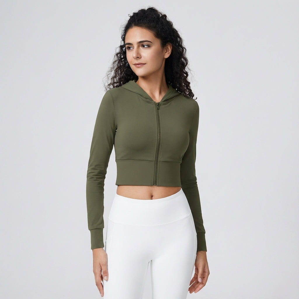 Elastic Iris green women's activewear zip training top, ideal for athletic activities