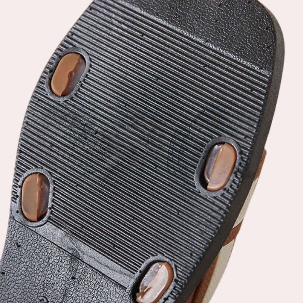Comfortable Isla flat sandals for women, essential for versatile summer outfits and daily fashion.