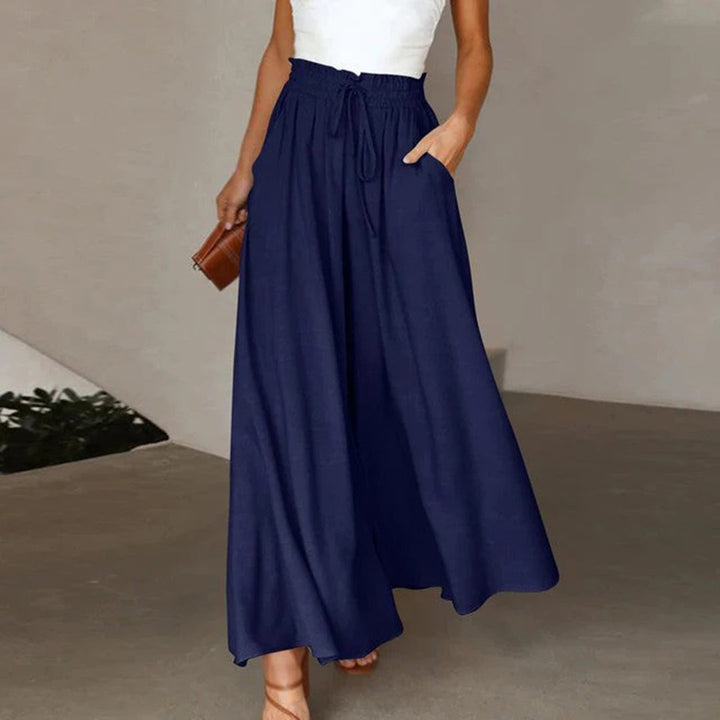 Women's Isla high waist wide leg trousers. Chic, comfortable polyester for versatile casual fashion.
