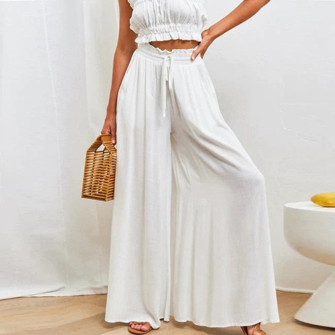 Flattering Women's Isla high waist wide leg trousers. Stylish, comfortable & versatile for everyday chic.