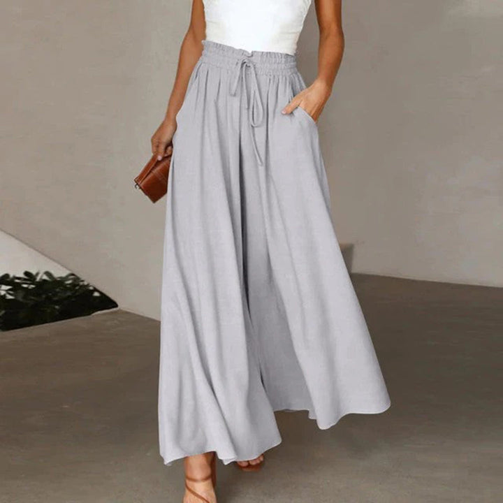 Versatile Women's Isla high waist wide leg trousers. Perfect for chic casual outfits, blending comfort & style.