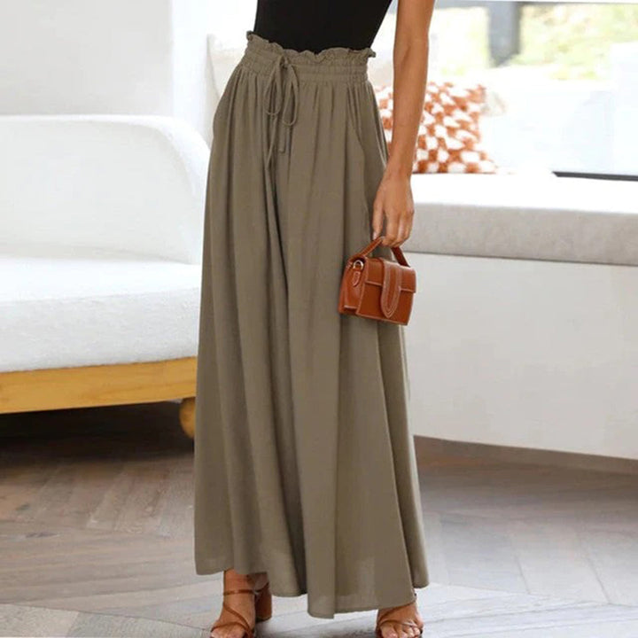Stylish Women's Isla high waist wide leg trousers. Polyester blend provides comfort & a chic, versatile look.