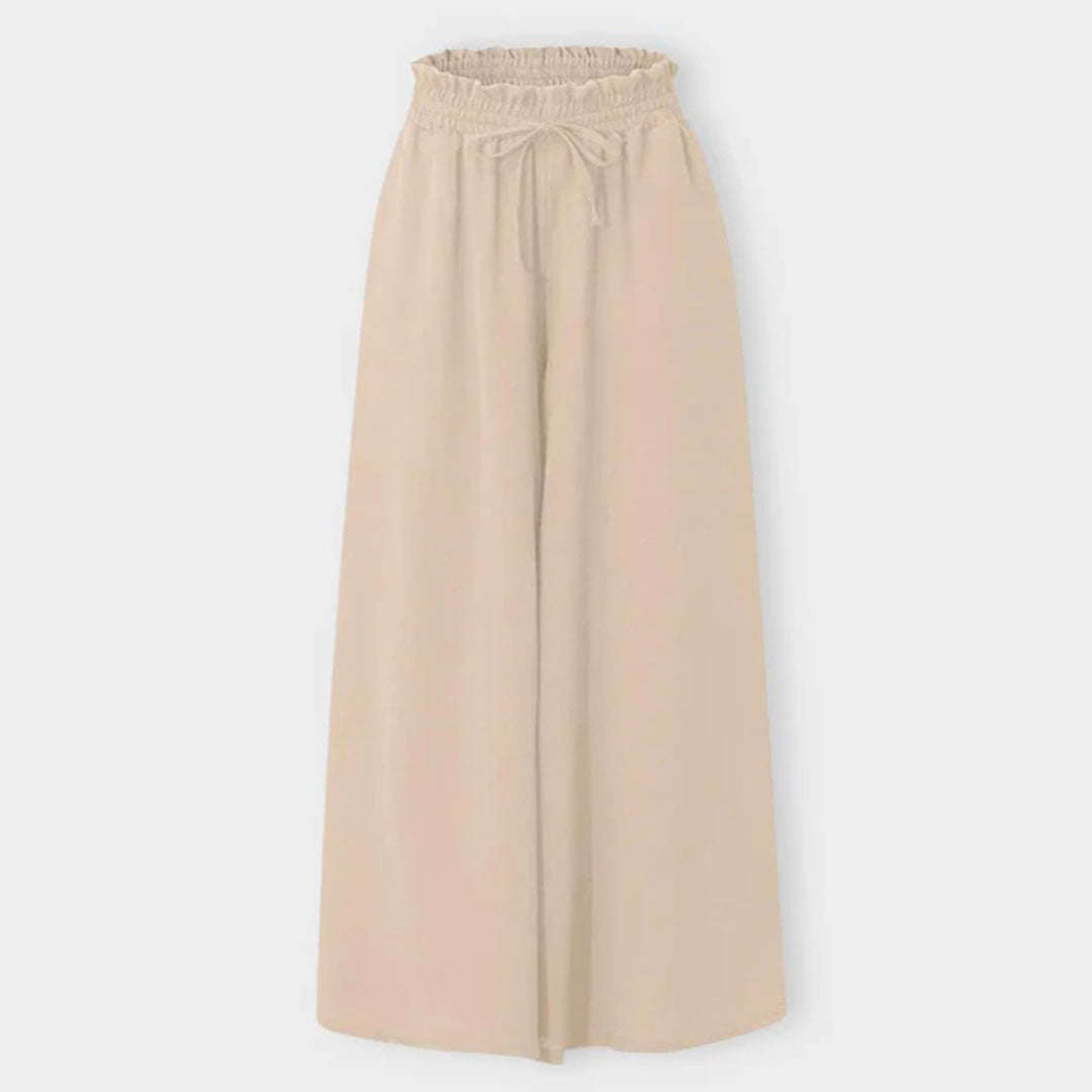 Women's Isla wide leg trousers with high waist. Comfortable polyester fabric for a relaxed yet fashionable vibe.