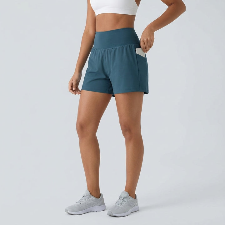 High-waisted women's athletic shorts, Ivy 2-in-1 design with built-in pockets for activewear.