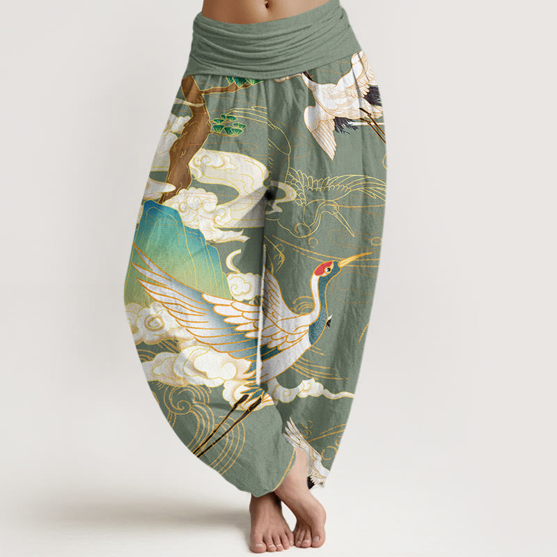Detail shot of the graceful Japanese crane art print on women's comfortable and flowy harem pants.