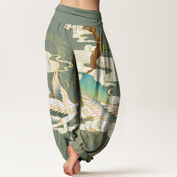 Full view of women's statement Japanese crane art harem trousers, displaying the wide leg and artistic design.