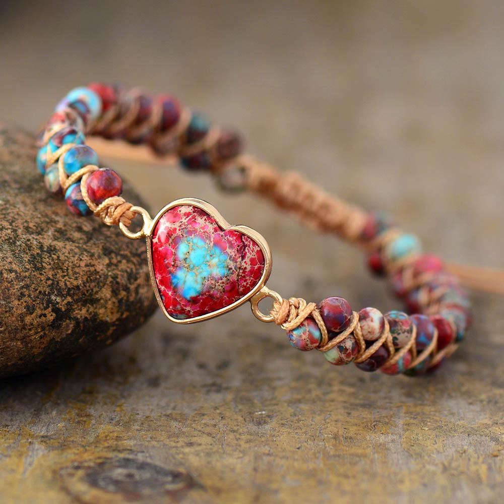 Close-up of women's Jasper gemstone bracelet, showing unique patterns & vibrant colors of beads