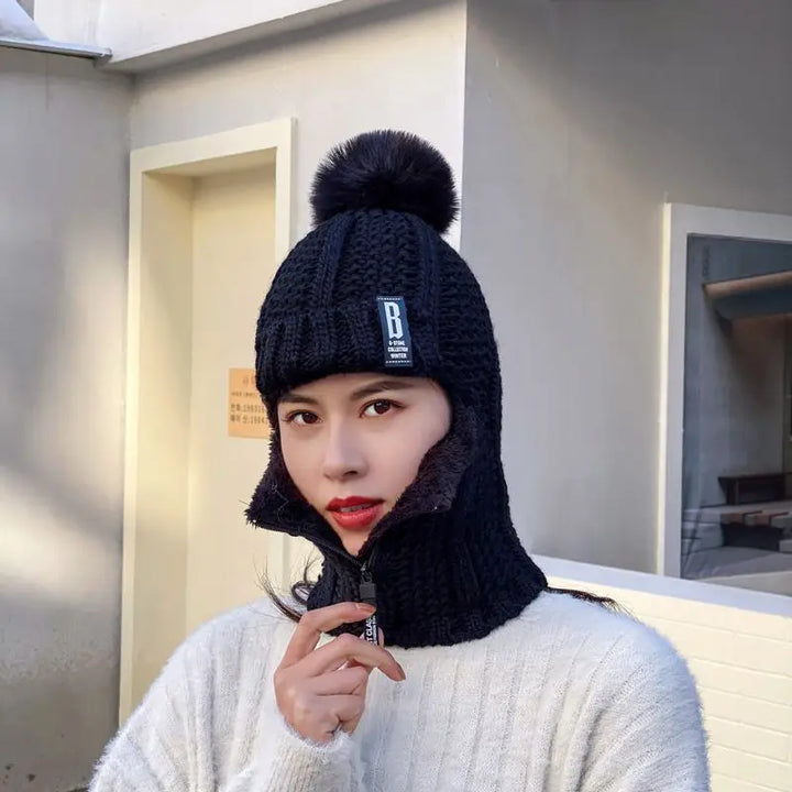 Cozy women's wool blend knitted balaclava, soft and warm with a stylish pompom for ultimate winter comfort.
