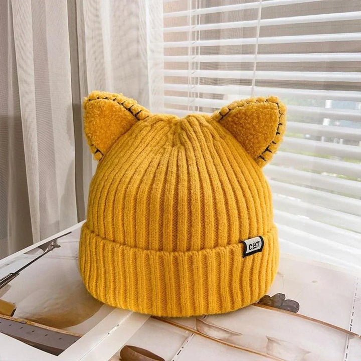 Fashionable women's winter hat, distinctive cat ear design, knitted for warmth and cuteness