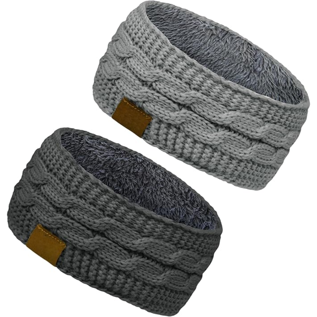 Model smiling, wearing a Cathryn knitted ear warmer headband, demonstrating its snug and warm fit.