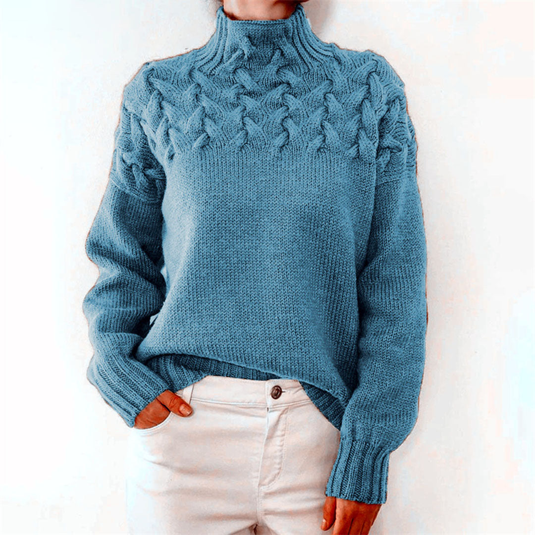 Women's knitted turtleneck sweater, cozy and elegant long-sleeve top for fall and winter fashion.