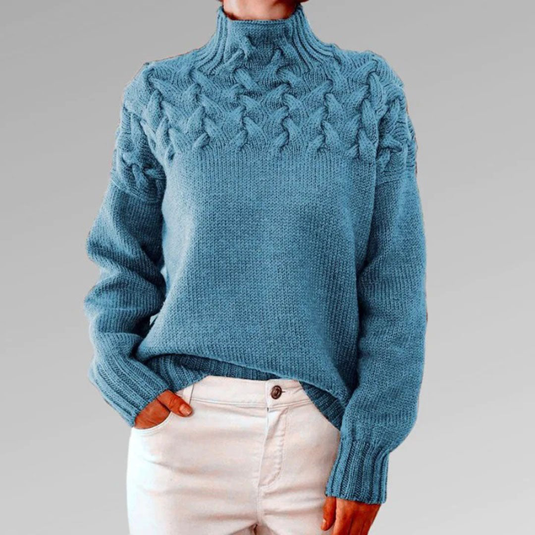Soft knit women's turtleneck sweater, perfect for a chic and cozy winter look. Classic style ladies' top.