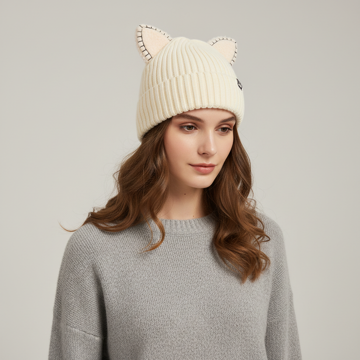 Close-up of a warm knitted cat ear beanie for women, perfect winter fashion