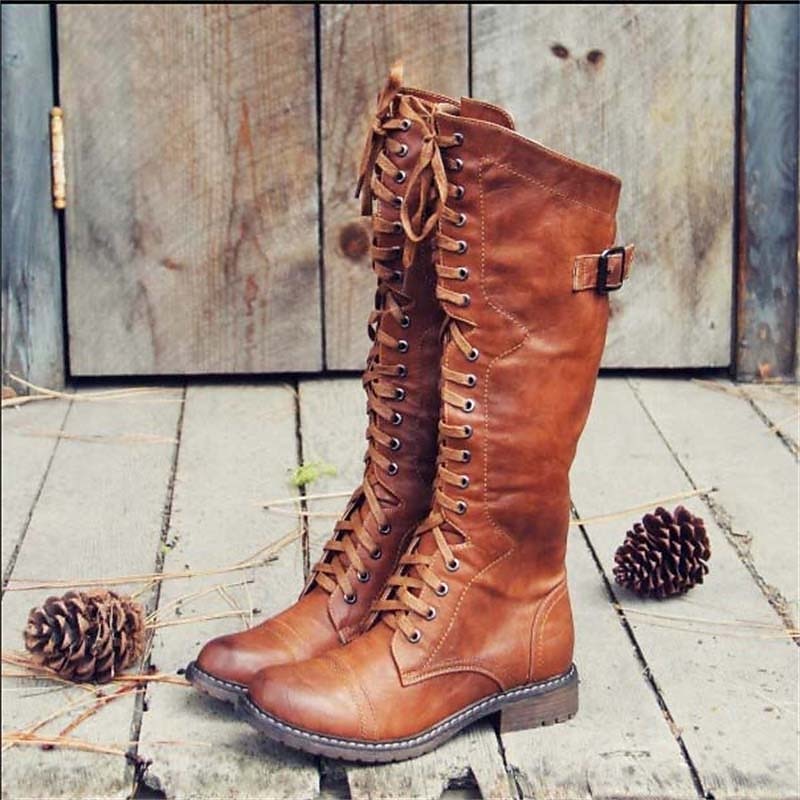 Women's lace-up knee-high riding boots for casual everyday wear, stylish and comfortable fall/winter footwear.