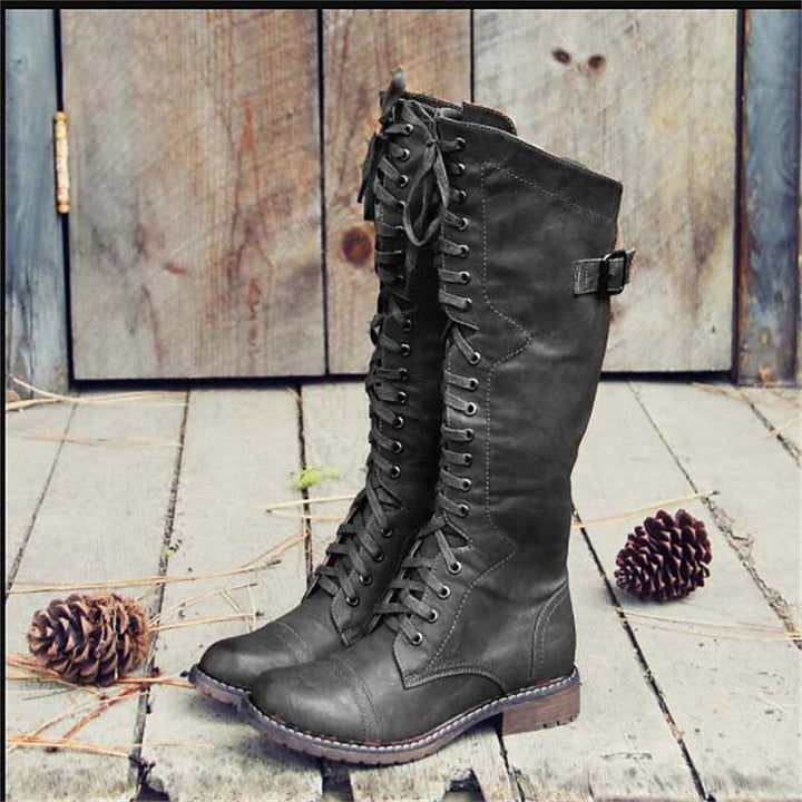 Elegant women's knee-high lace-up riding boots for fall and winter, ideal casual everyday fashion footwear.
