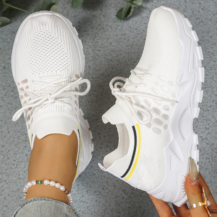 Breathable women's orthopedic lace-up sneakers, cushioned for ultimate comfort & foot support.
