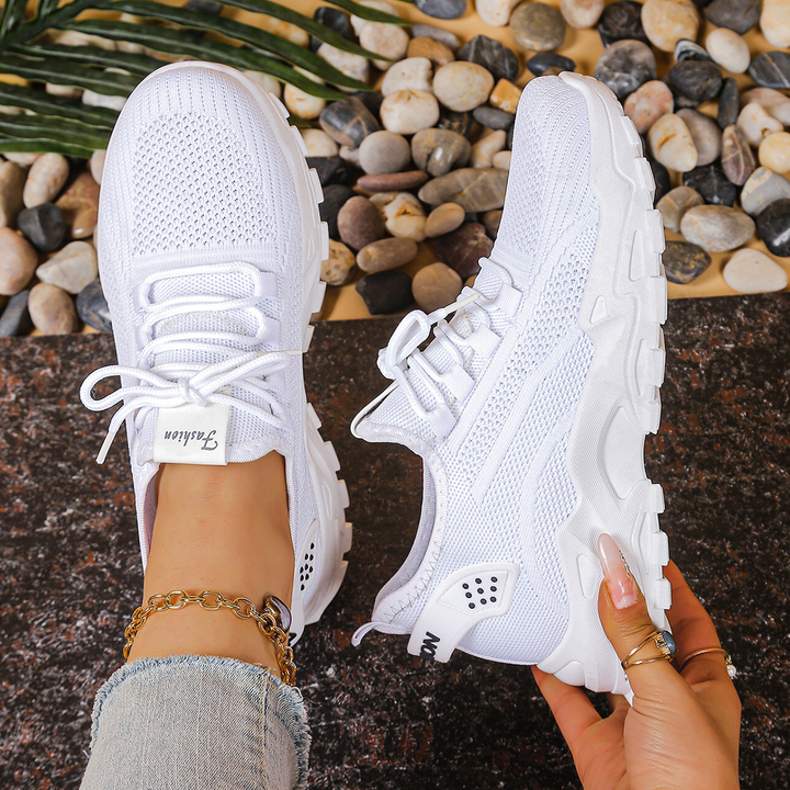 Breathable women's lace-up orthopedic sneakers with cushioned insoles for comfortable daily walking.