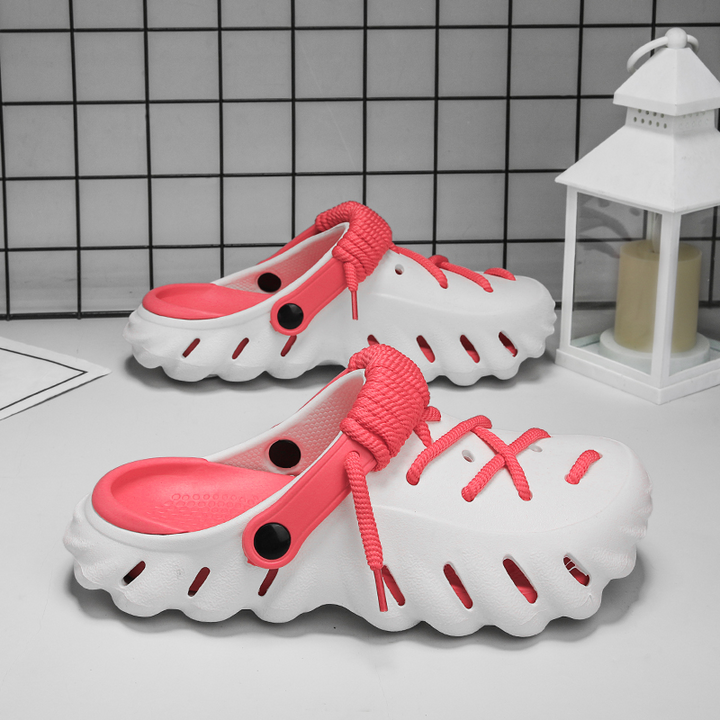 Women's Laced Clogs for ultimate comfort. Stylish, lightweight, & water-friendly slip-on shoes.