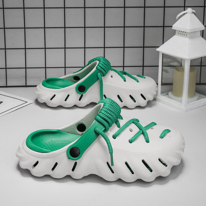 Slip-on women's laced clogs. Ultimate comfort, lightweight, & adjustable for fashionable summer wear.