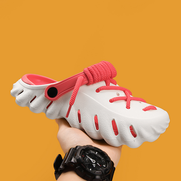 Adjustable women's laced clogs. Comfortable, lightweight slip-on shoes, perfect for summer casual style.