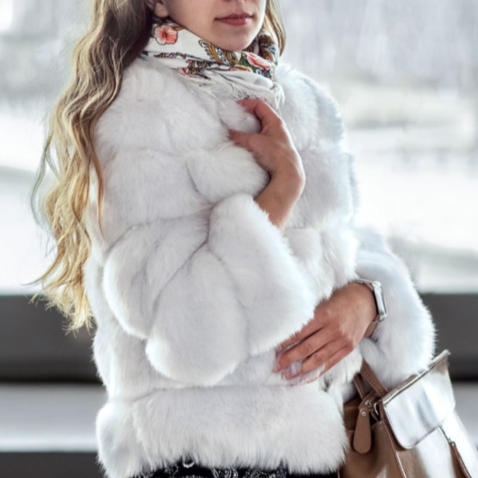 Model wearing a stylish Lana women's plush open front winter coat, perfect for cozy and warm cold weather fashion.